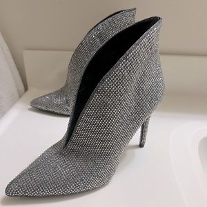 Jessica Simpson Pewter heel. Black undertone with silver studs. Size 8.5.